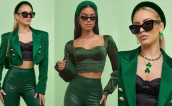 woman wearing a chic emerald green tailored blazer with a modern cropped fit