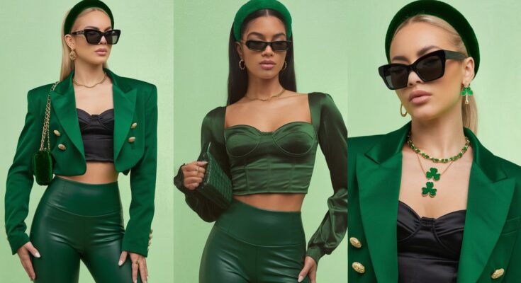 woman wearing a chic emerald green tailored blazer with a modern cropped fit